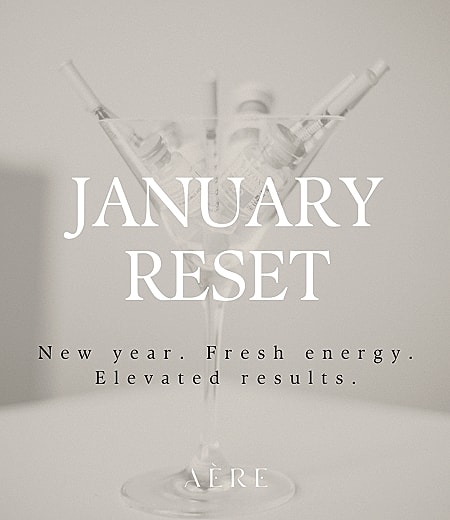 Martini glass with skincare products for January reset.