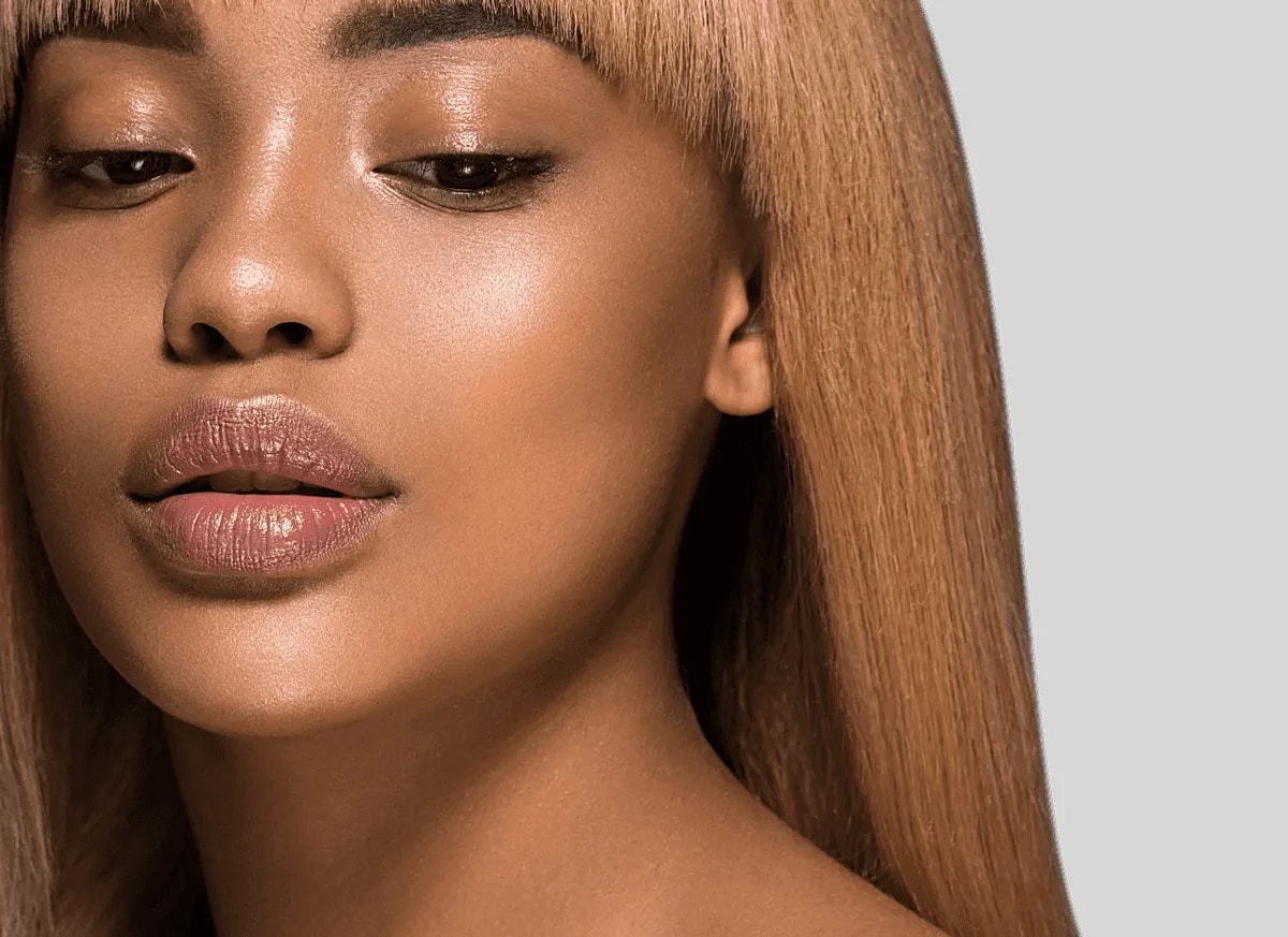 Close-up of woman with smooth, radiant skin.