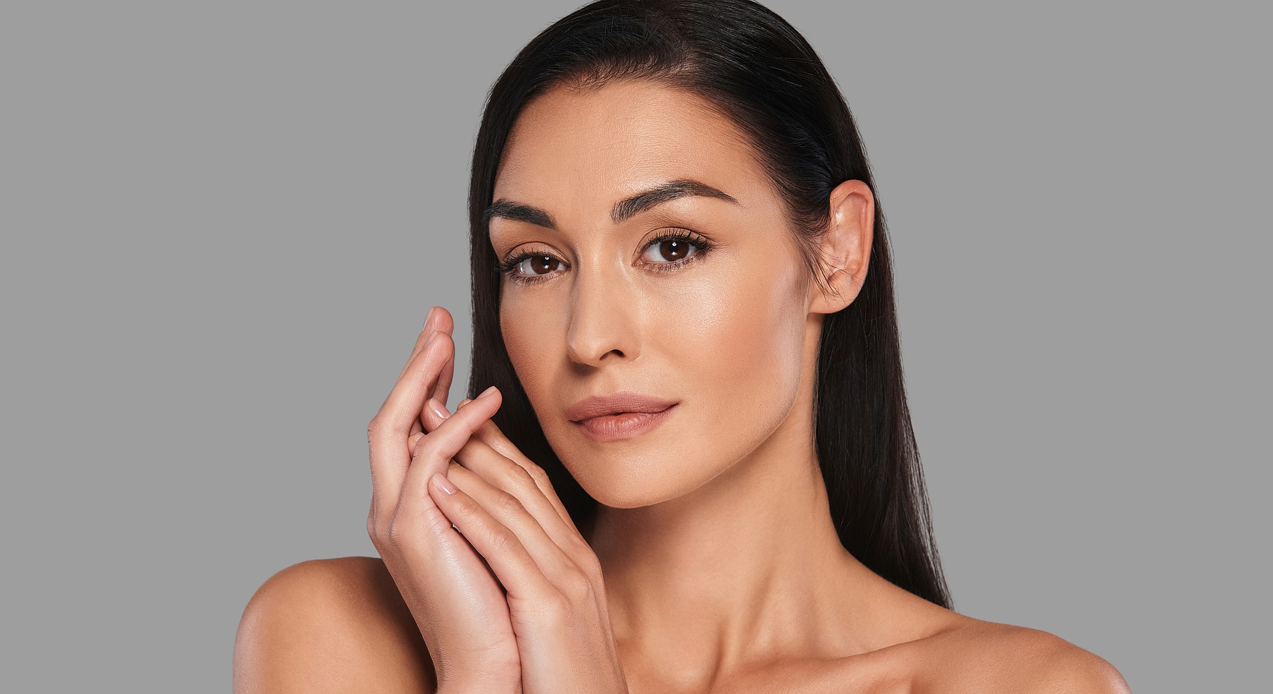 Portrait of a woman with long, dark hair